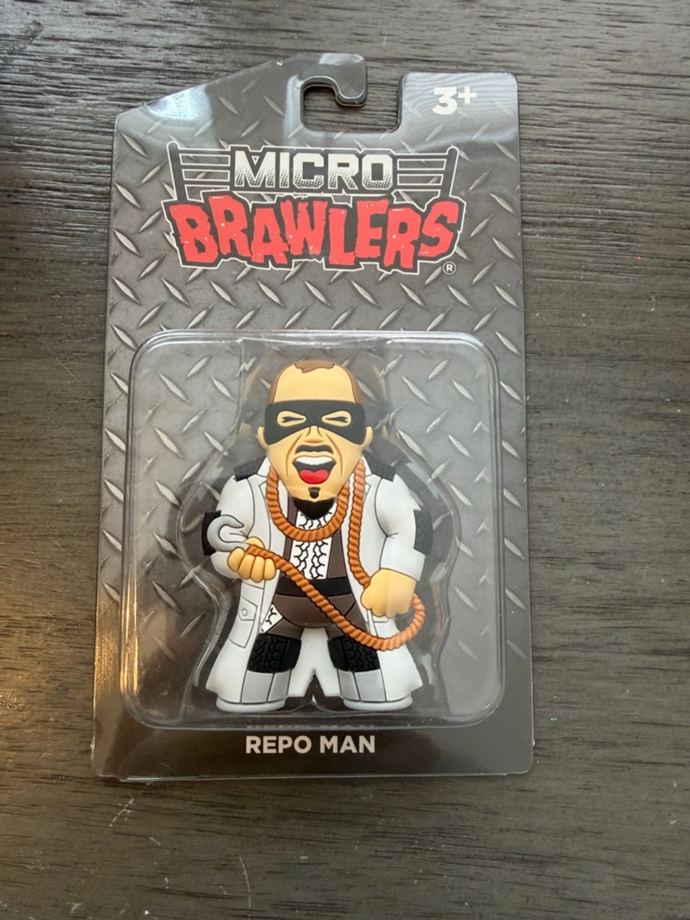 Micro Brawlers Repo Man Action Figure - White & Black